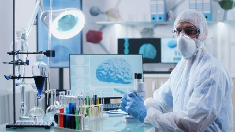 Neurotherapy specialist analyzing brain-related medical data in a laboratory